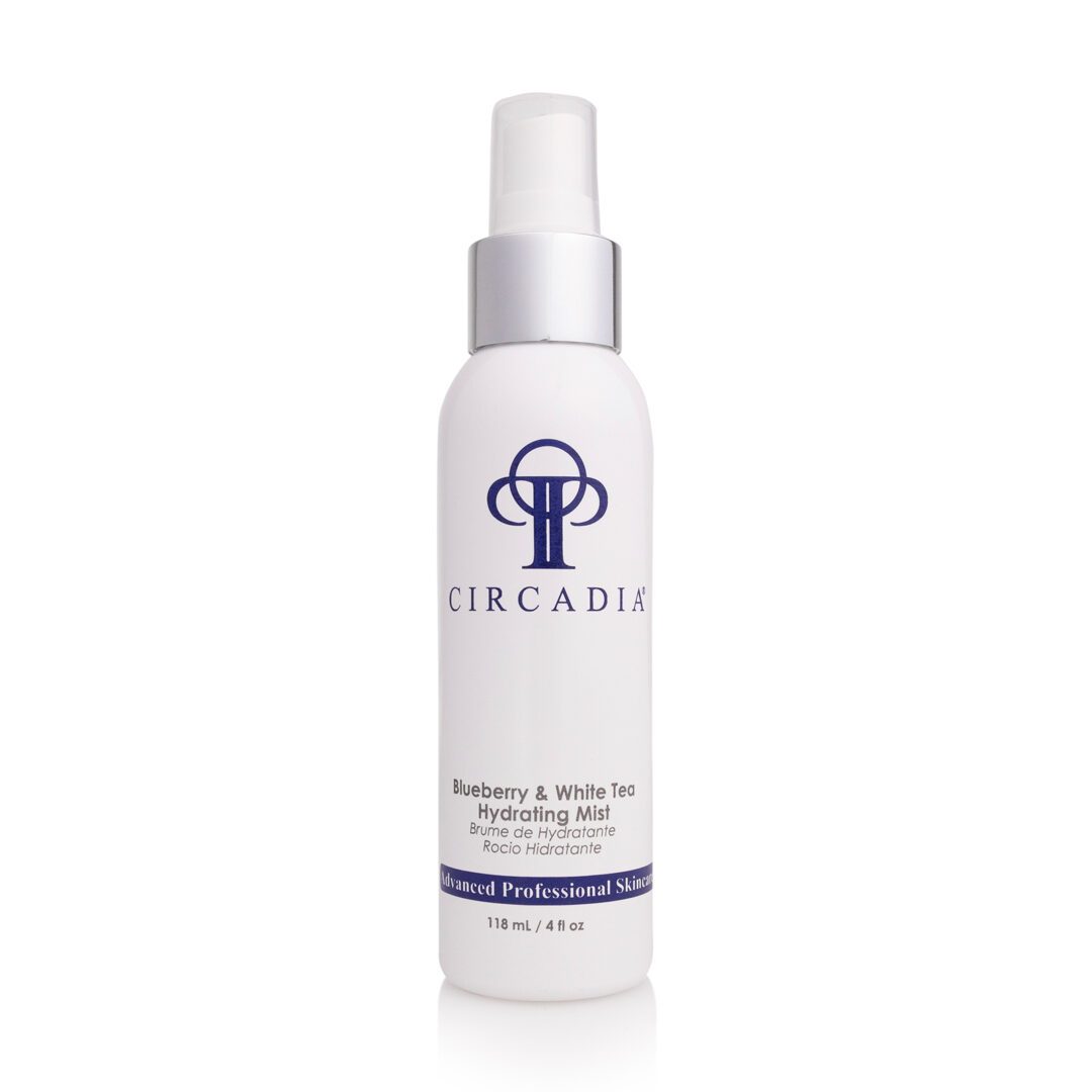 6802b35c89c53_Blueberry & White TEa Hydrating Mist A bottle of skin care product with white label.