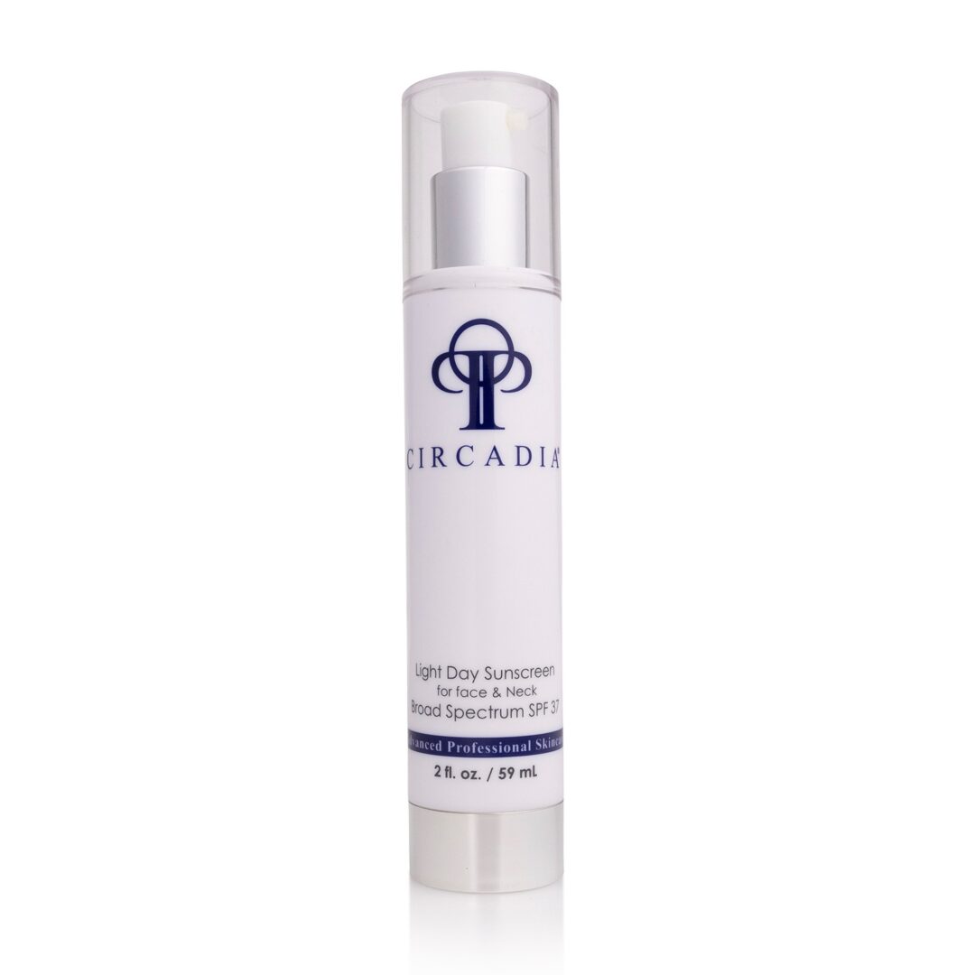 6802b35ce16bb_LIGHTDAY Sunscreen A bottle of arcaro skin care product.