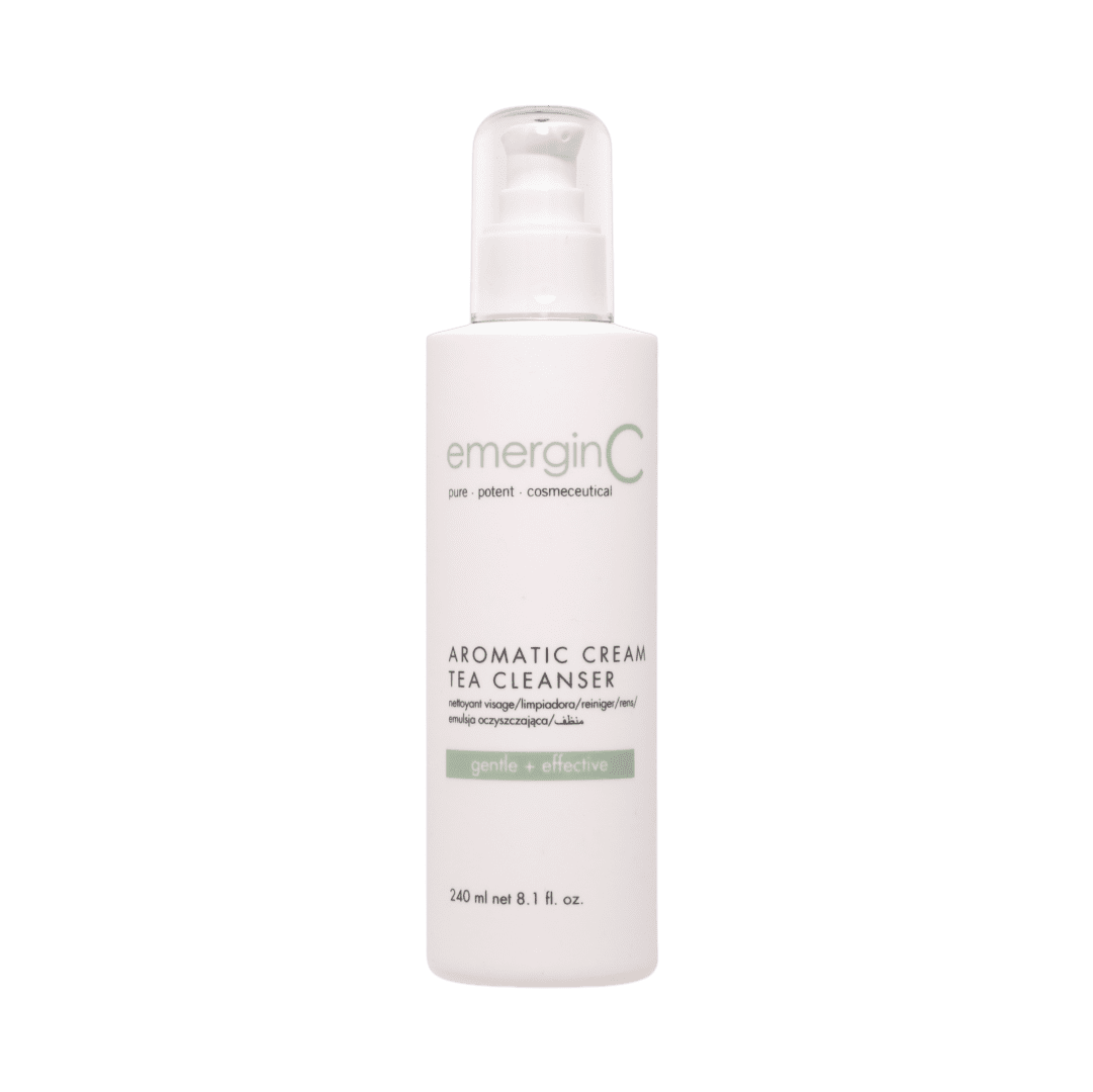 AROMATIC CREAM CLEANSER A bottle of cream cleanser on a green background
