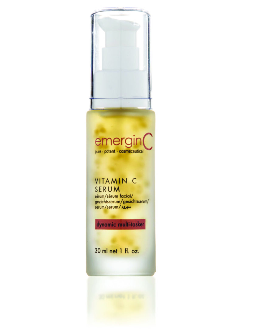 Vitamin C Serum A bottle of serum with the words " emergo c " written on it.